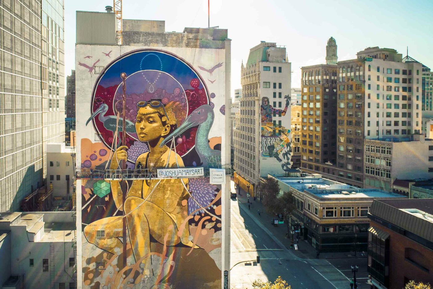 An art mural on the side of a building in Oakland, California, USA.