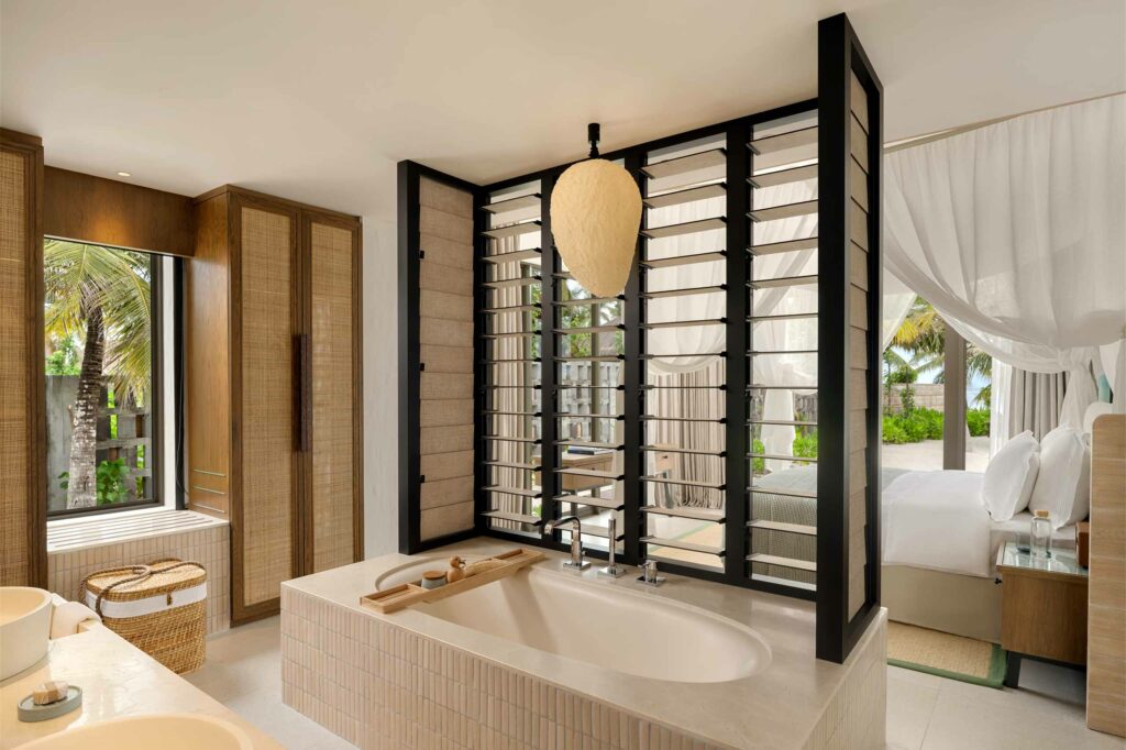 Bathtub inside a Beach Retreat at Six Senses Kanuhura, The Maldives