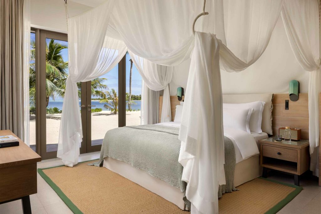 A bedroom inside a Beach Retreat at the Six Senses Kanuhura, The Maldives