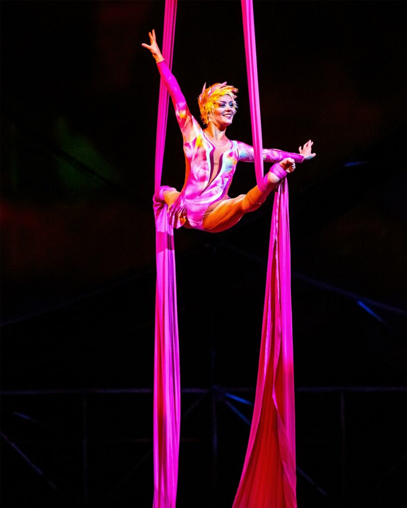 An acrobat performs at Cirque du Soleil, which belongs on any trip to Las Vegas with children