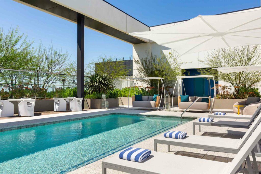 An outdoor pool at The Viv Hotel.