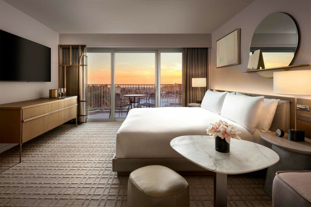 Bedroom with a sunset view at Fairmont Century Plaza, Los Angeles, California, USA.