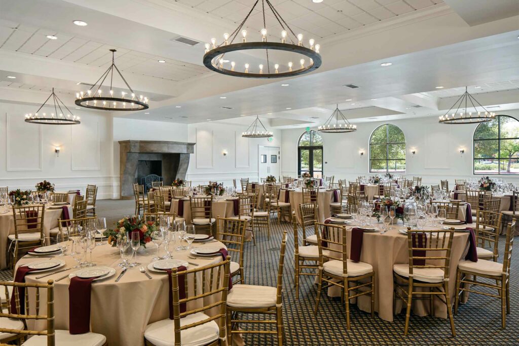 Event space with dinner tables at Hotel Winters, Winters, California, USA.
