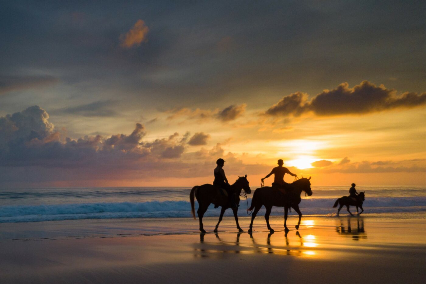 Horses on the beach at sunset, NIHI Sumba, Sumba, Indonesia