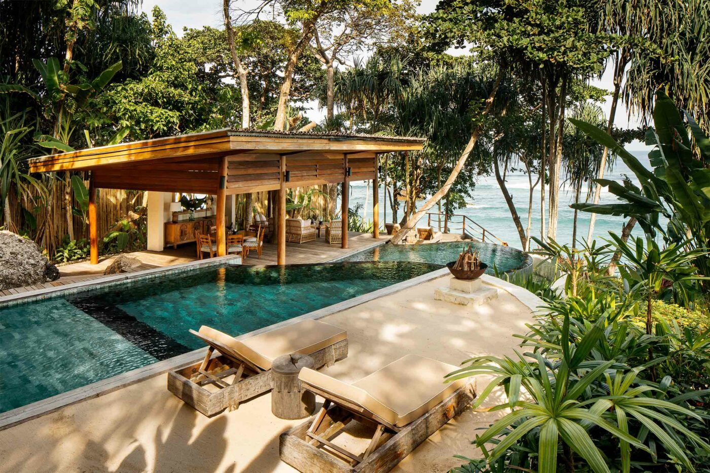 Poolside loungers at NIHI Sumba, Sumba, Indonesia