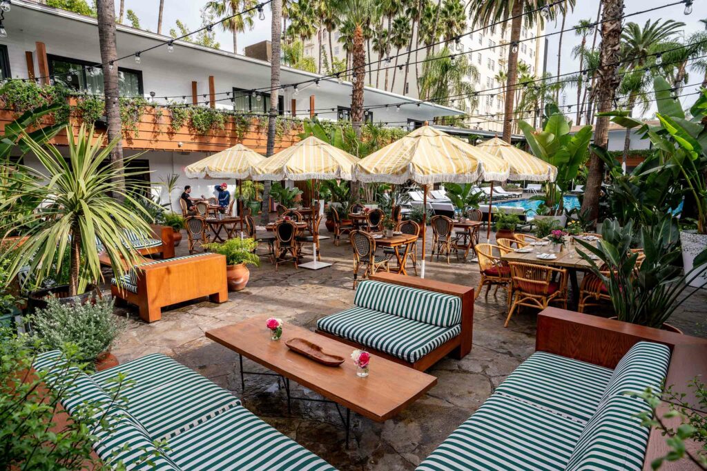 An outdoor seating area near the pool at the Hollywood Roosevelt.