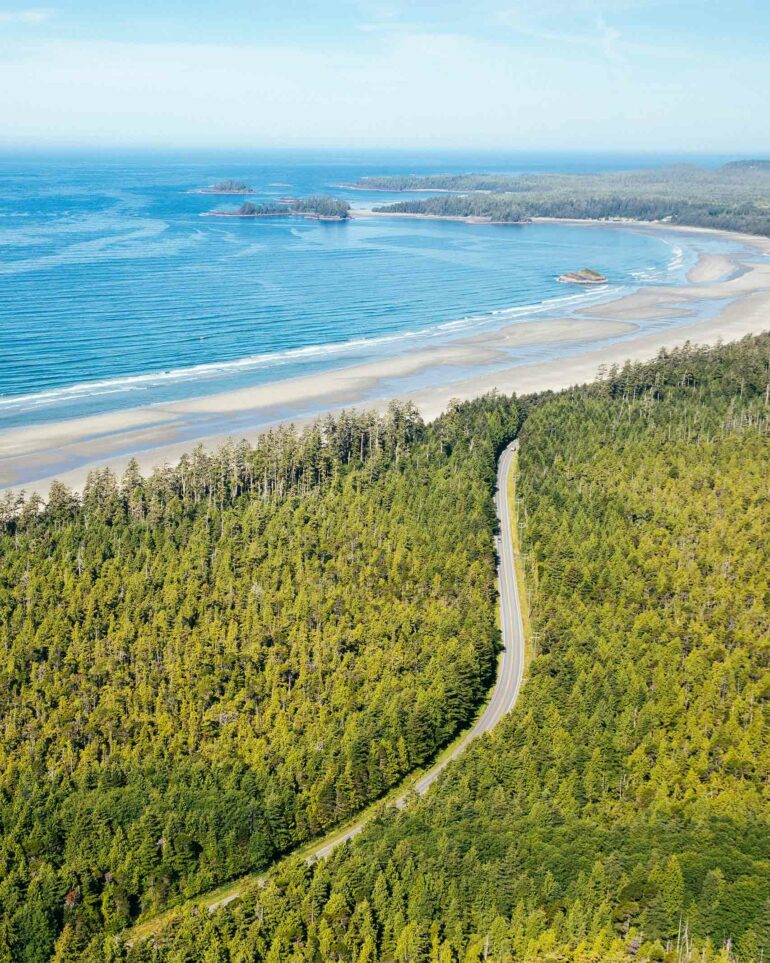 A street amidst the forest near the beach in Tofino, Vancouver Island, Canada