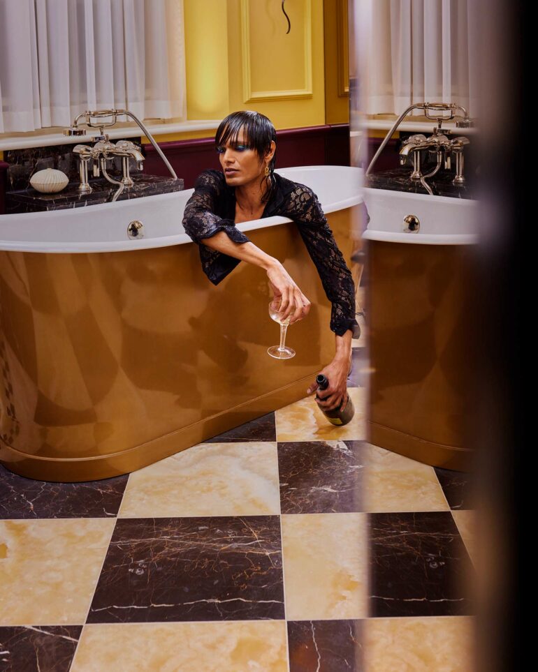 Namal Lanka enjoys champagne in a bathtub at l'oscar London, United Kingdom