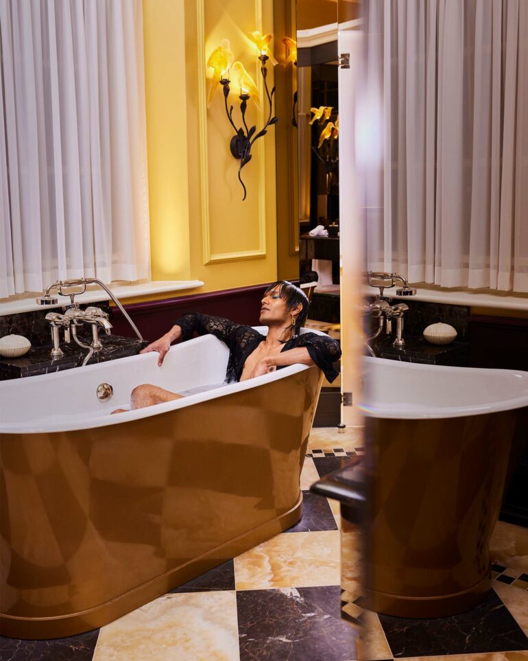 Namal Lanka models a black lace shirt at l'oscar London, United Kingdom