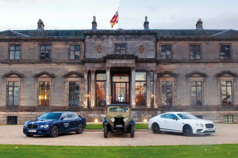 Luxury cars park outside Broomhall House, Edinburgh, Scotland