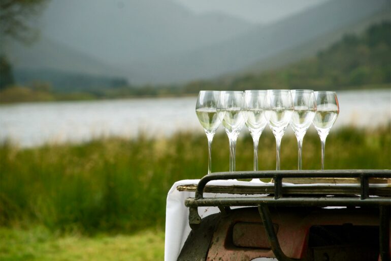 Drinks are served near a Loch. Scottish cuisine is all about experiences. Perthshire, Scotland