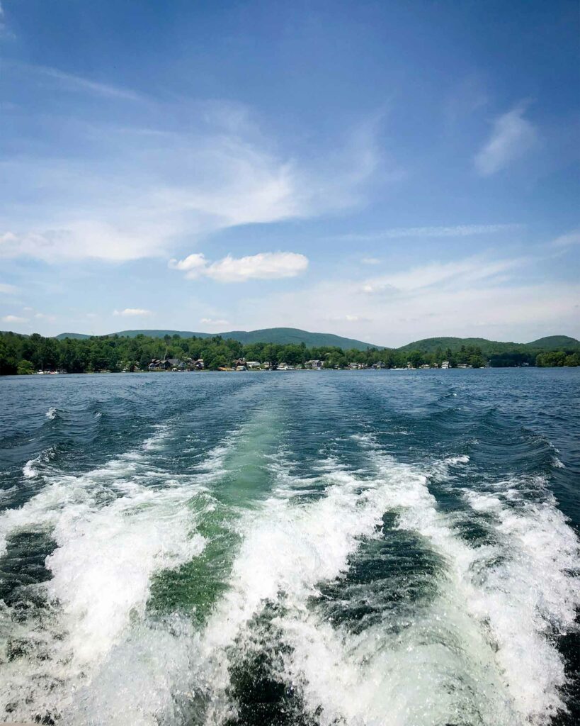 Boating on a lake outside Boston, Massachusetts, USA