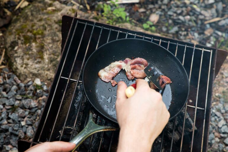 A guest prepares breakfast himself in forest. Scottish hotels are putting experiences first.