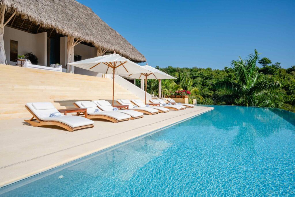Poolside loungers at Careyes, Costalegre, Jalisco, Mexico