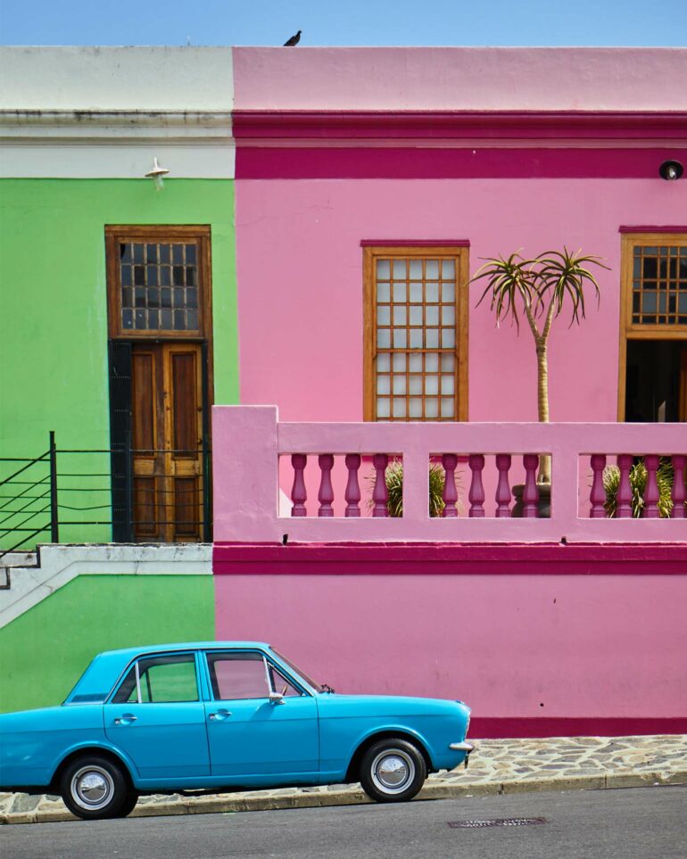A car is parked outside colourful houses in the Bokaap, Postcards from Cape Town, Cape Town, South Africa