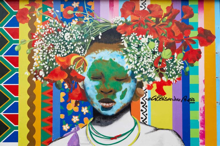 Mural of a person with flowers in their hair in the Salt River District, Postcards from Cape Town, Cape Town, South Africa