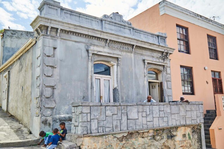 Locals outside their house in the Bokaap, Postcards from Cape Town, Cape Town, South Africa