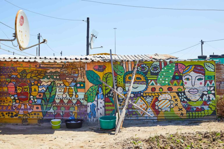 A mural in Khayelitsha township, part of a Juma Art Tours experience, Cape Town, South Africa