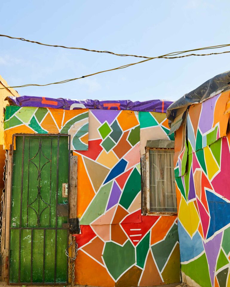 Colourful houses in Khayelitsha, as soon during a Juma Art Tour experience, Cape Town, South Africa