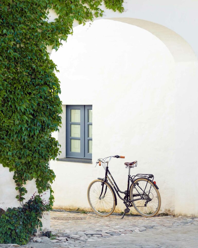 A bicycle leans against a wall at São Lourenço do Barrocal, Alentejo, Portugal