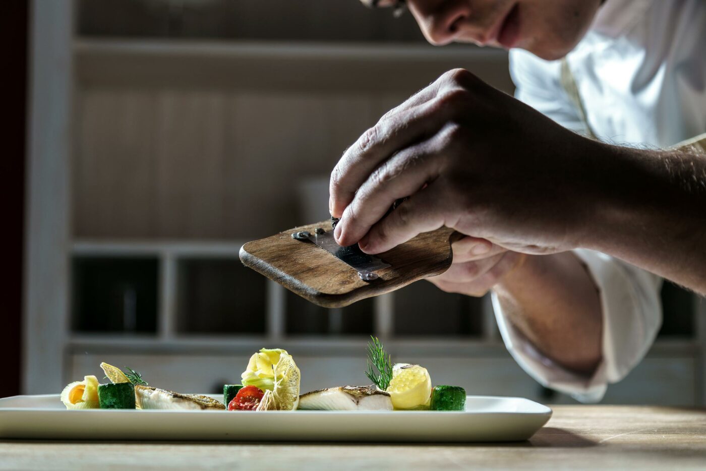 A chef readies a healthy meal at The Original FX Mayr, Lake Wörthersee, Austria