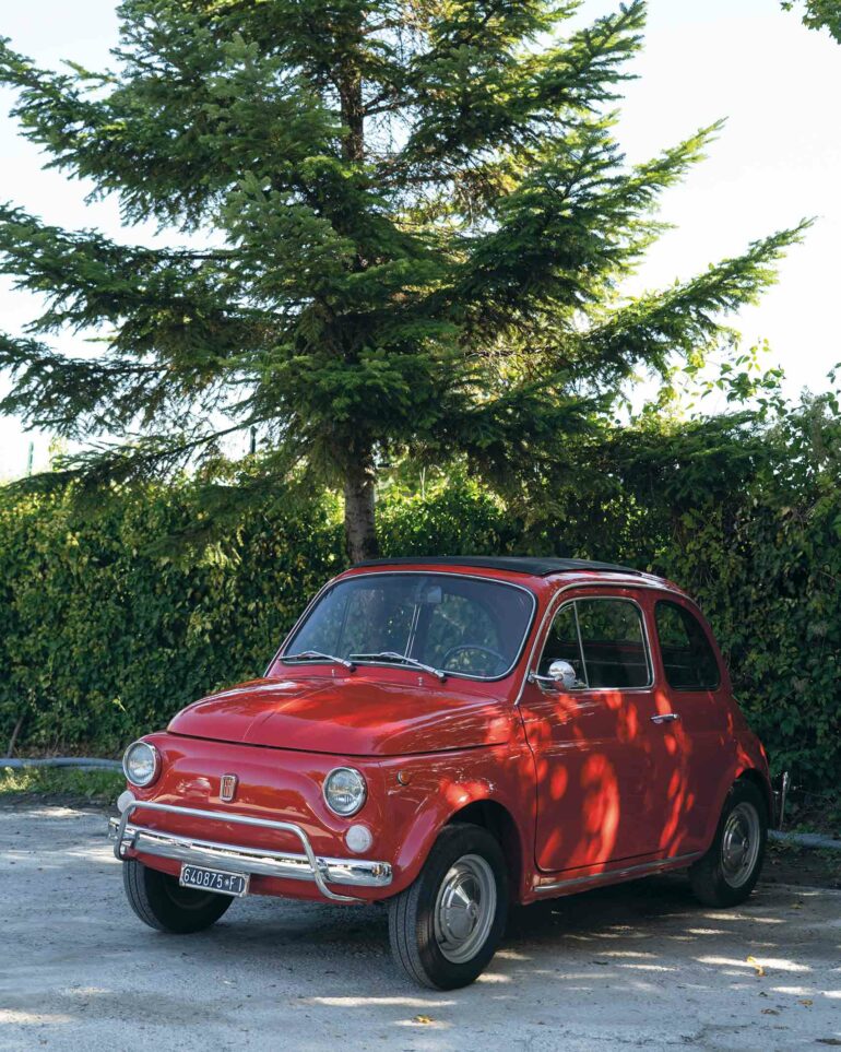 A red Fiat car in Tuscany, Italy