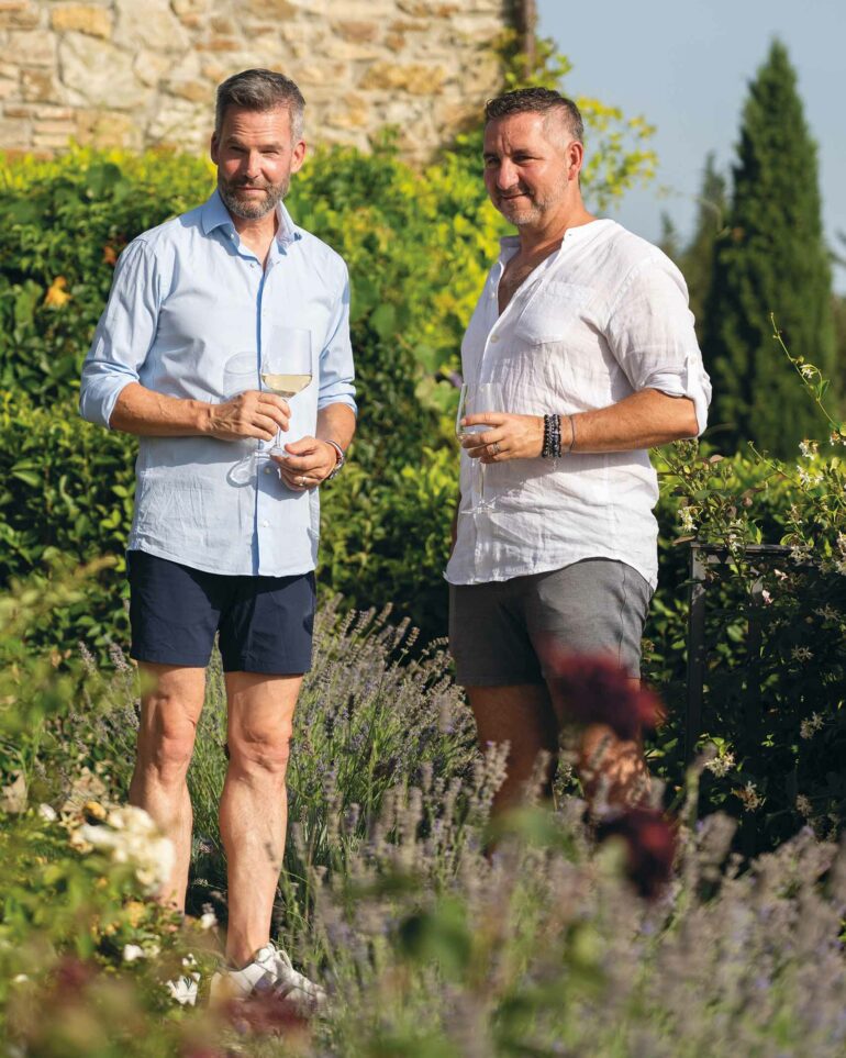Stephen Lewis and Christian Scali pose outside Villa Ardore, Tuscany, Italy
