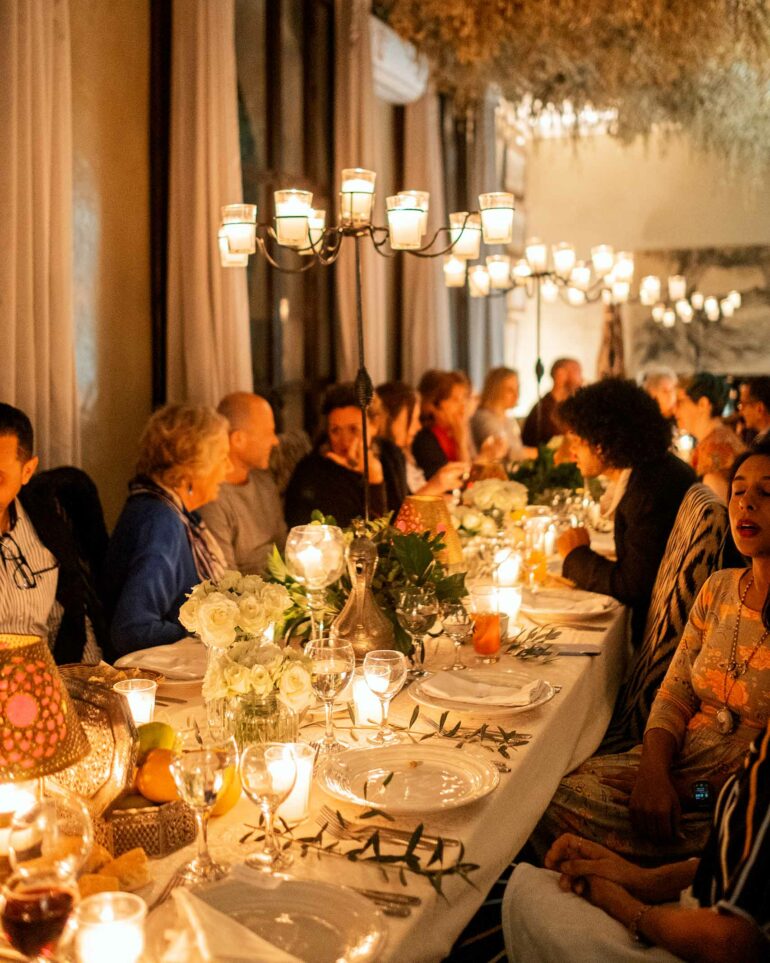 Attendees dine together during a writing retreat by Silk Road Slippers, Marrakech, Morocco