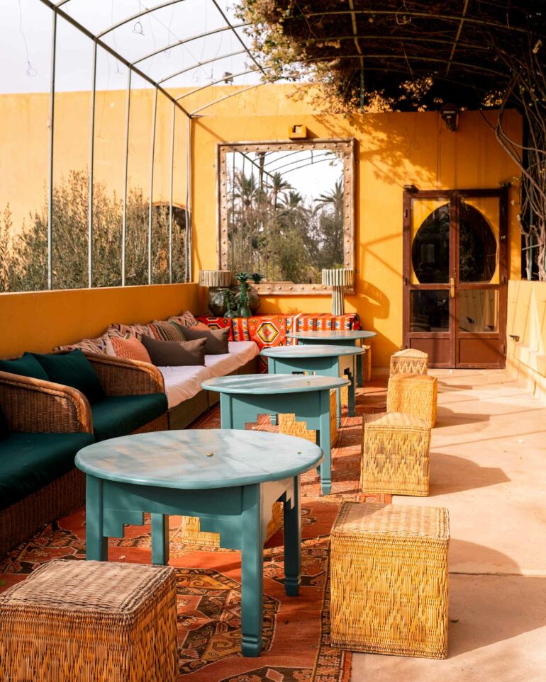 Moroccan tables in a conservatory at Jnane Tamsna, Silk Road Slippers, Marrakech, Morocco
