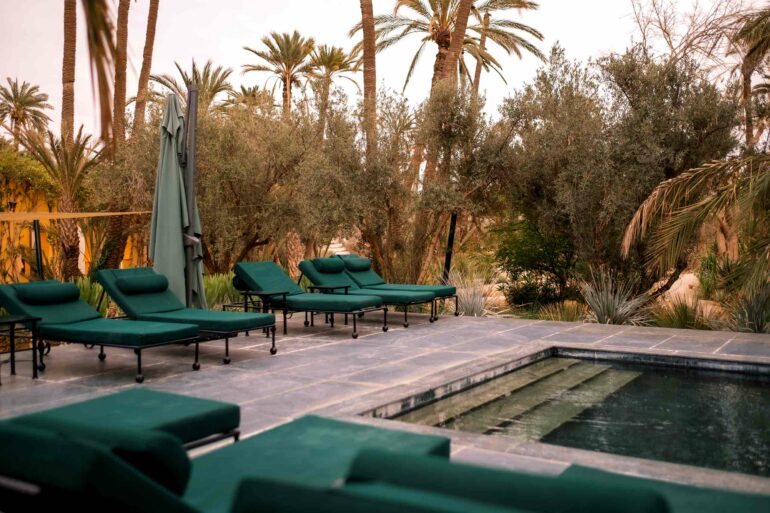 Poolside loungers at Jnane Tamsna, captured during a writing retreat by Silk Road Slippers, Marrakech, Morocco