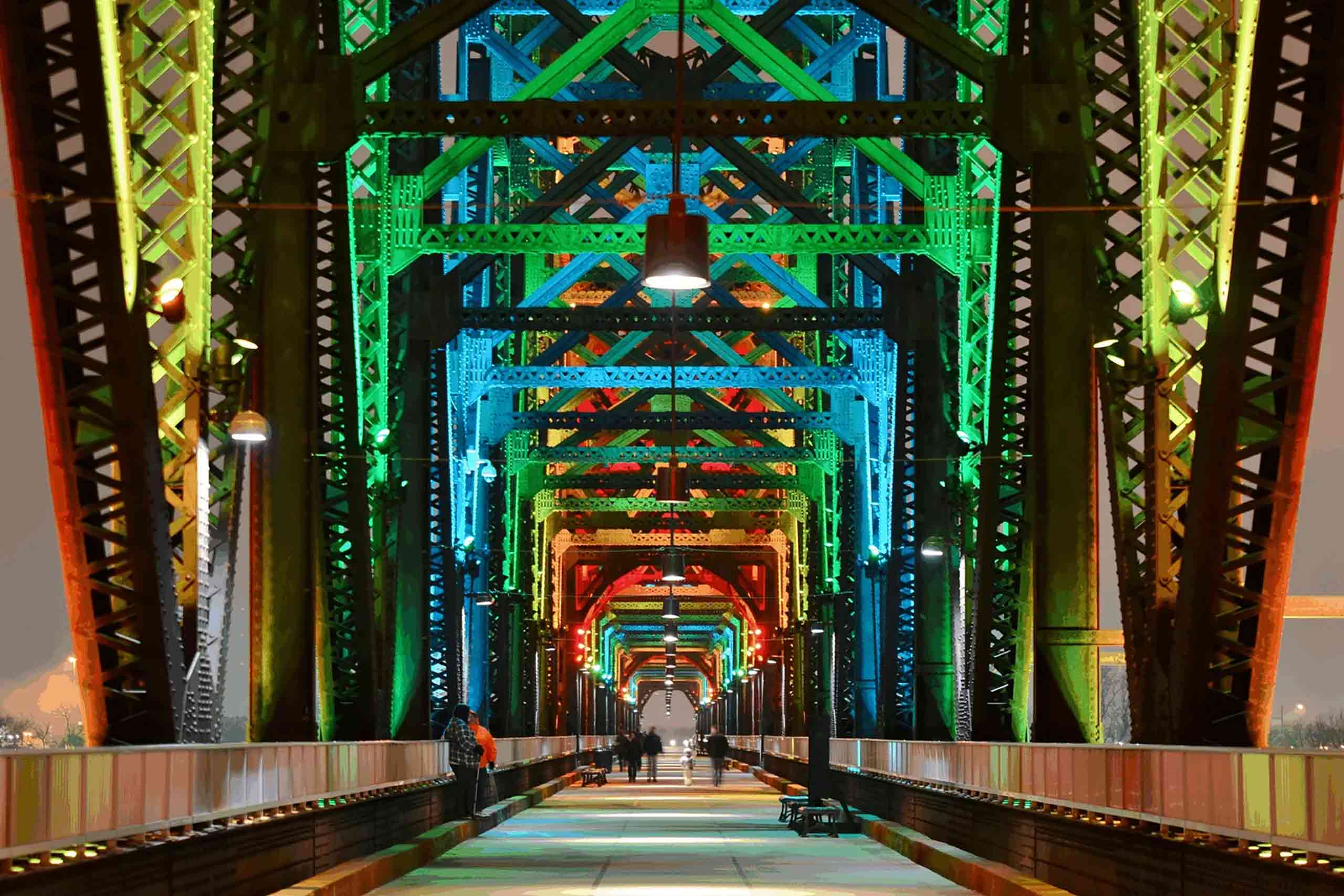 Louisville Big Four Bridge lit up in rainbow colours