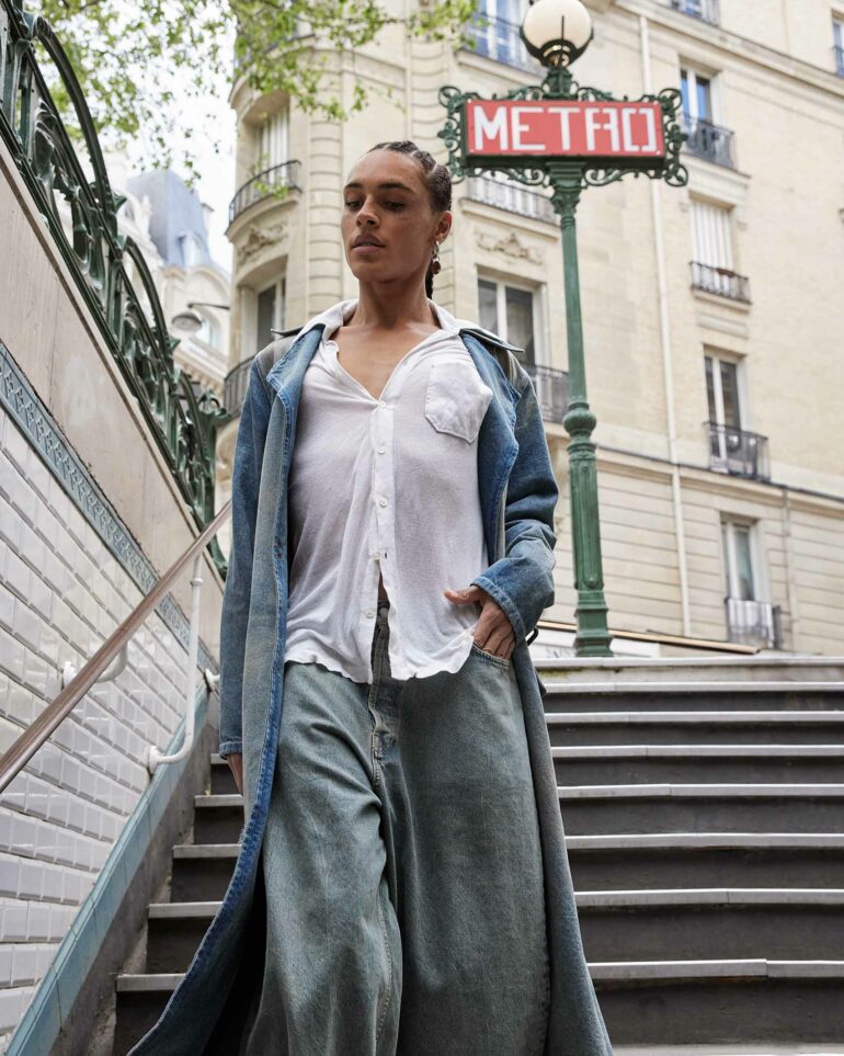 Koko Barno descends into a Metro station in Paris, France