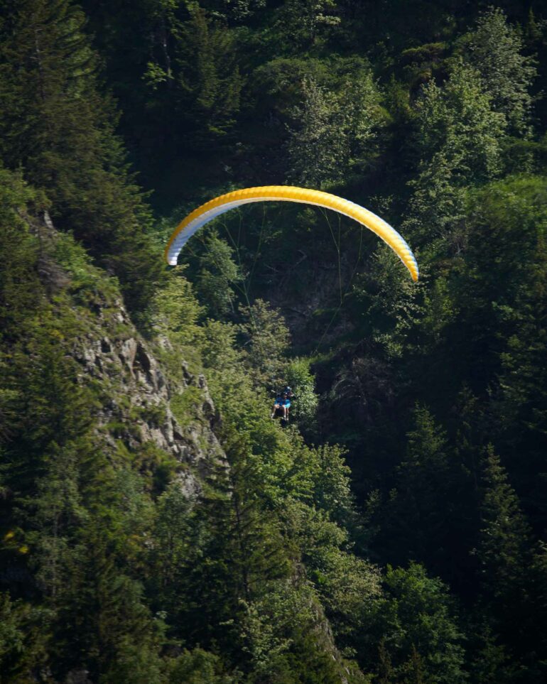 Paragliders mid-air in Les Deux Alpes, France