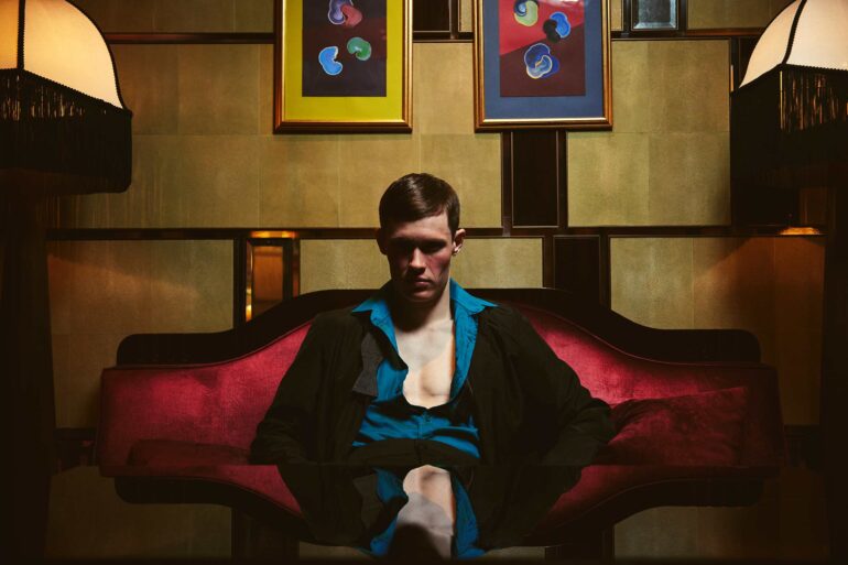 Jill Leflour poses for a picture inside the bar at The Corinthia Hotel in London, United Kingdom