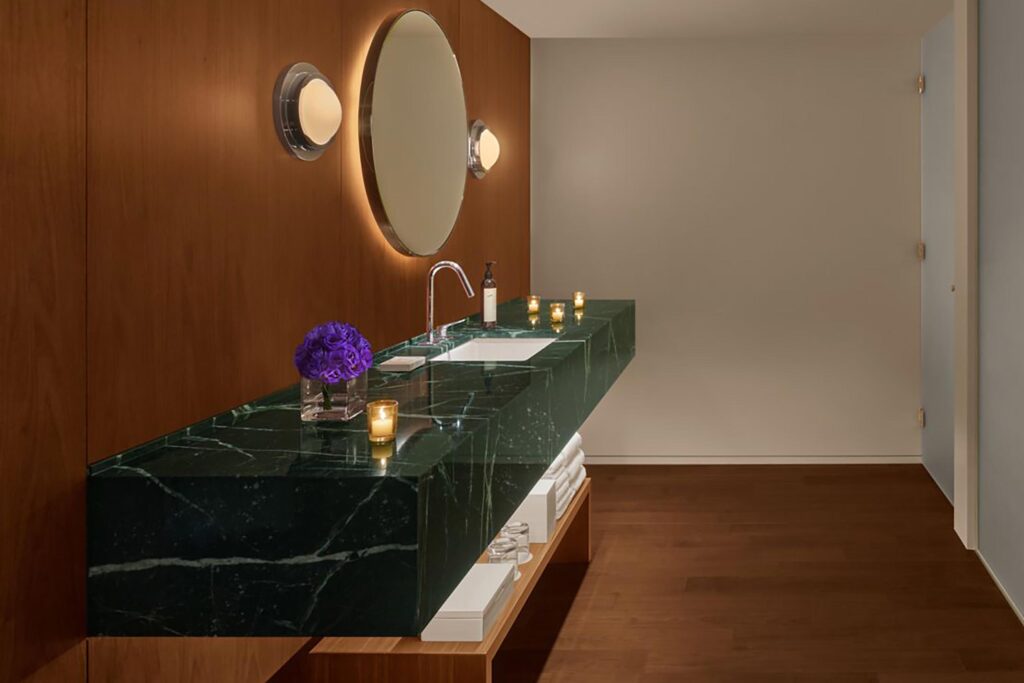 Black-green marble surface and vanity