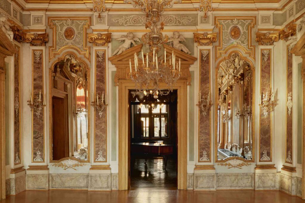 Ornate, gilded ballroom at Aman Venice