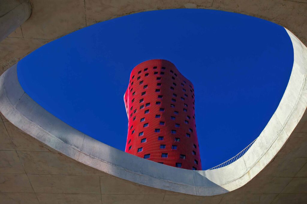 Red tower building framed. Travel proud in Barcelona, Spain