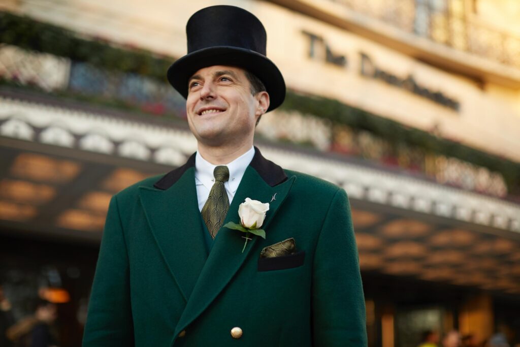 Doorman in green tunic at The Dorchester London