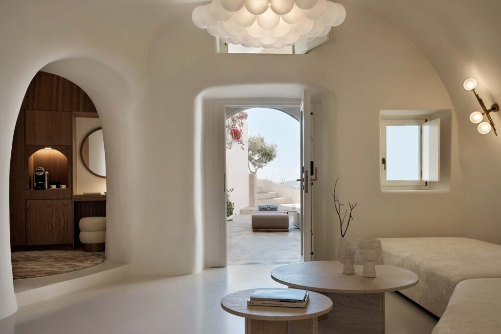 Cave suite with clean, neutral, minimalist decor at Andronis Boutique Hotel in Santorini