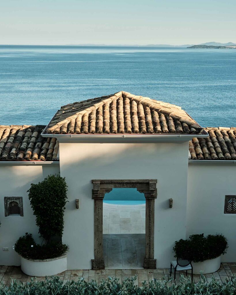 Arched doorway overlooking the sea
