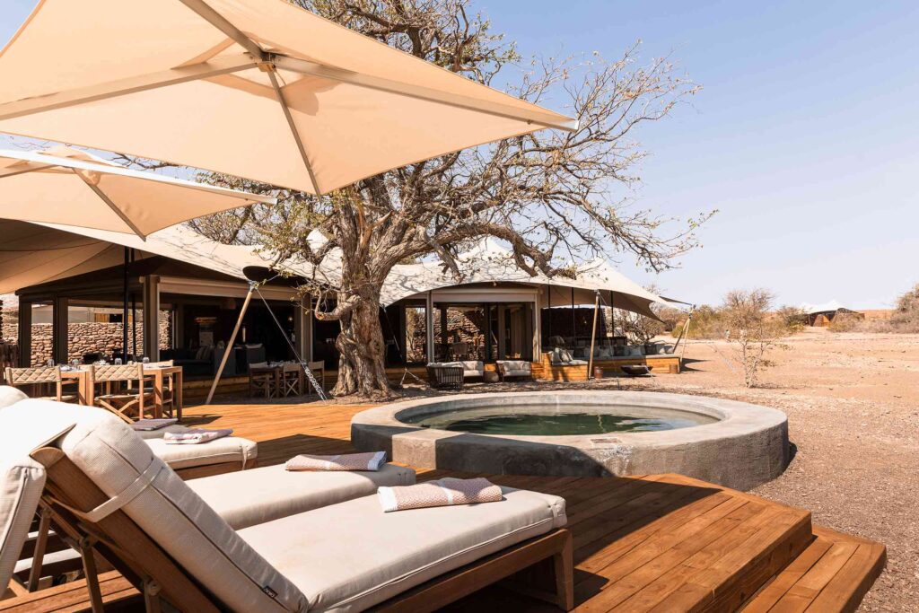 Poolside loungers at Desert Rhino Camp, Damaraland, Namibia