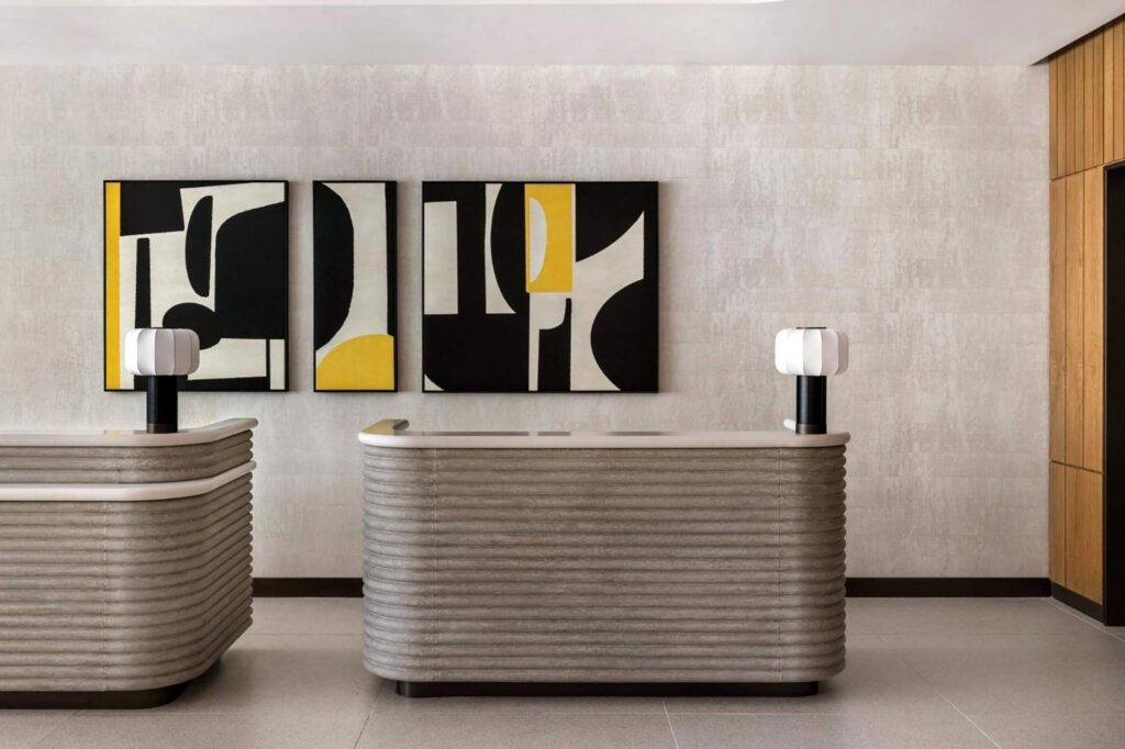 Reception desks at Kimpton Theta New York - Times Square, NYC, USA