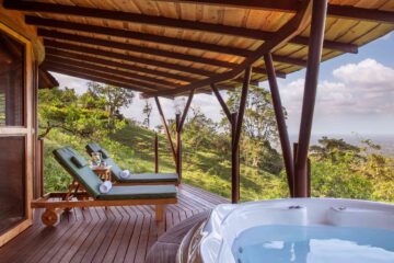 Poolside loungers at Origins Lodge, Alajuela, Costa Rica