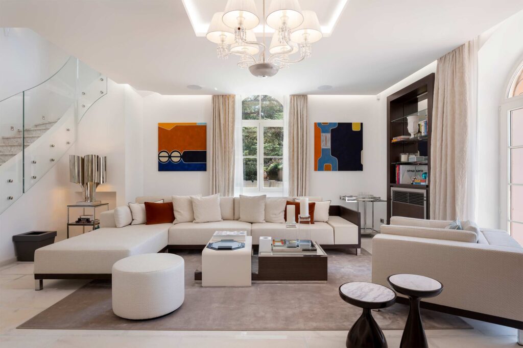 Ultima Collection x Burgess Yachts - artful interiors of Ultima Corfu with contemporary images on the wall