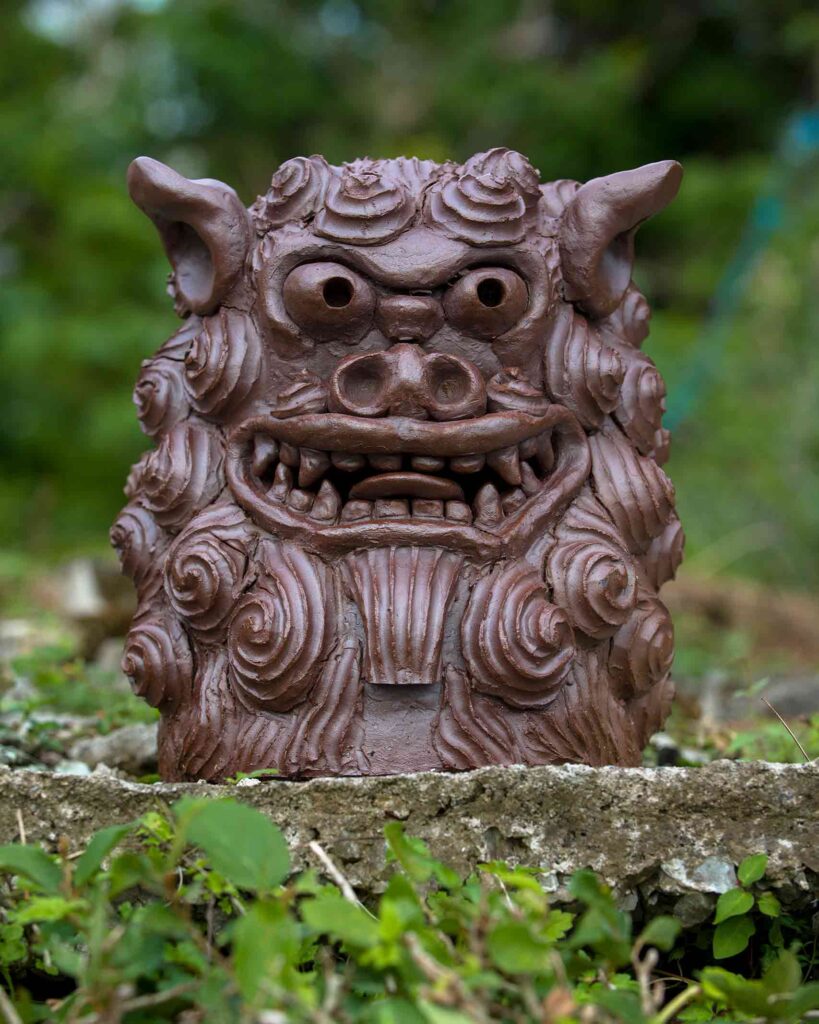 A clay cast Shisa statue, mythical lions of Okinawa believe to protect from evil