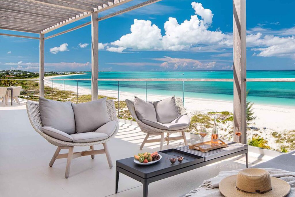 Terrace with a view of Cape Grace beach at Wymara Resort + Villas