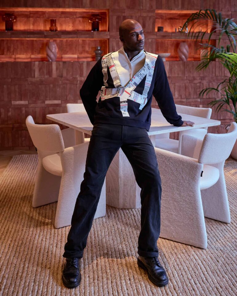 Folu Odimayo strikes a pose while modelling contemporary British clothing at the Sir Devonshire Square Hotel in London, UK