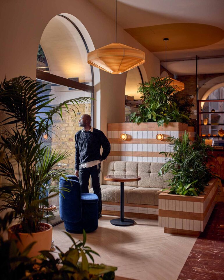 Folu Odimayo strikes a pose in the lobby of Sir Devonshire Square Hotel in London, UK