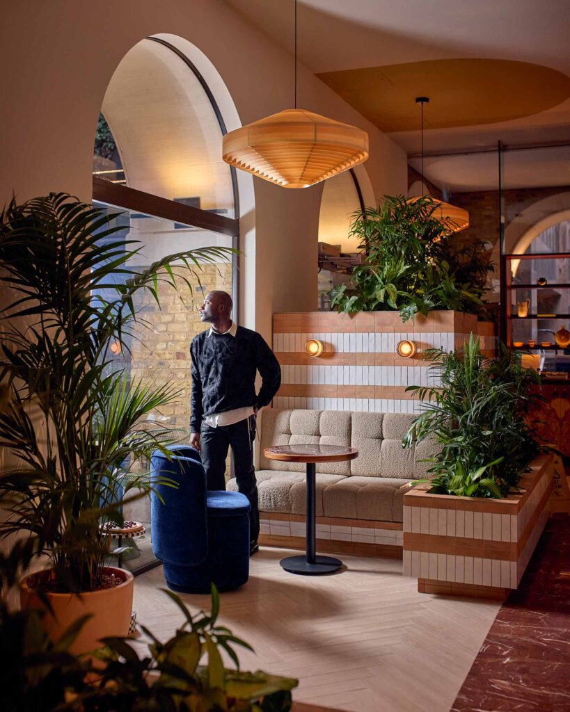 Folu Odimayo strikes a pose in the lobby of Sir Devonshire Square Hotel in London, UK