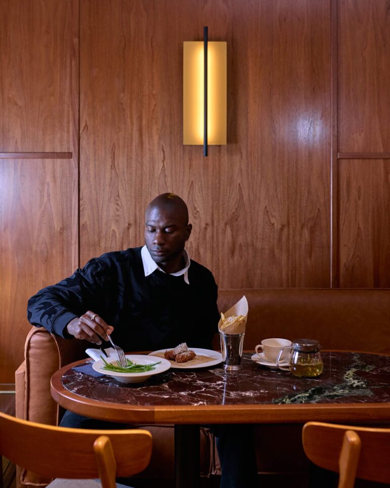 Folu Odimayo eats a meal at Sir Devonshire Square Hotel in London, UK